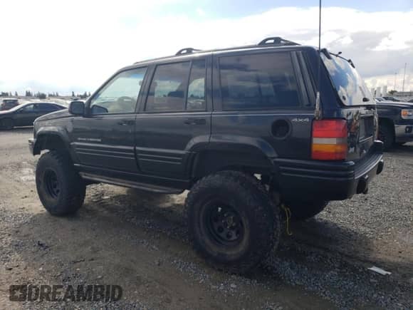 1998 Jeep Grand Cherokee Limited с VIN 1J4GZ78Y4WC312654, выставлен на аукционе Copart как лот 86685605 с пробегом 187 978 миль миль и Чистый • Clean title. История ставок и продаж доступна на DreamBid. Изображение 2.