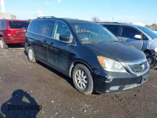 2008 Honda Odyssey EX-L with VIN 5FNRL38688B059027, listed as a IAAI auction lot 43520644 with 141,088 mi miles and . Bid and sale history available at DreamBid. Image 1.