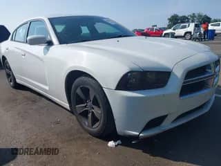 2014 Dodge Charger SXT with VIN 2C3CDXHG3EH312820, listed as a IAAI auction lot 42813716 with 185,192 mi miles and . Bid and sale history available at DreamBid. Image 1.