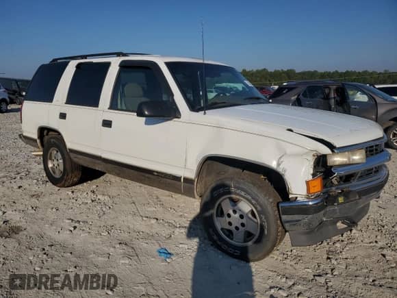 1995 Chevrolet Tahoe с VIN 1GNEK13K9SJ454349, выставлен на аукционе Copart как лот 75021914 с пробегом 287 175 миль миль и Списание • Salvage title. История ставок и продаж доступна на DreamBid. Изображение 4.