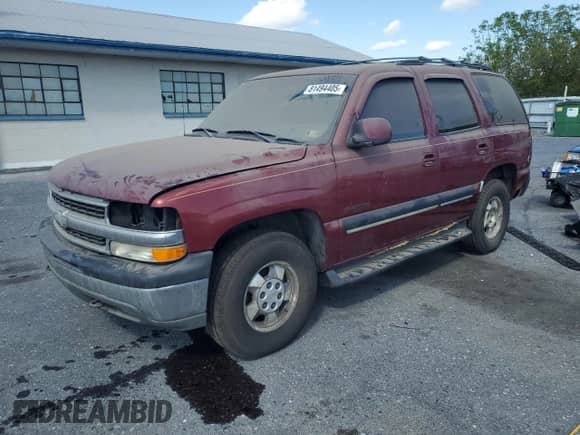 2001 Chevrolet Tahoe LT with VIN 1GNEK13T61R227452, listed as a Copart auction lot 81494405 with 222,223 mi miles and Salvage title. Bid and sale history available at DreamBid. Image 1.