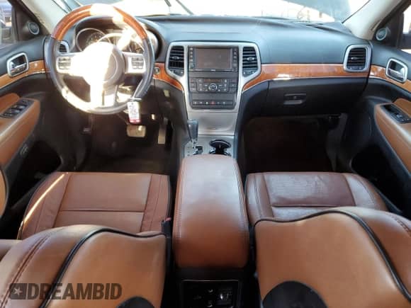 2012 Jeep Grand Cherokee Overland Summit z VIN 1C4RJFCT7CC156309, wystawiony jako Copart lot #86177895 z przebiegiem 138 200 mil mil oraz Szkoda całkowita • Salvage title. Historia ofert i sprzedaży dostępna na DreamBid. Obrazek 8.