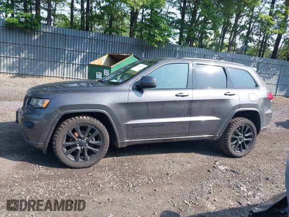 2017 Jeep Grand Cherokee Altitude with VIN 1C4RJFAG4HC807439, listed as a IAAI auction lot 42468652 with 149,807 mi miles and . Bid and sale history available at DreamBid. Image 14.