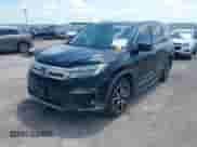 2020 Honda Pilot Elite with VIN 5FNYF6H0XLB032663, listed as a IAAI auction lot 42336547 with 102,386 mi miles and . Bid and sale history available at DreamBid. Image 2.