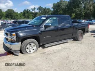 2018 Chevrolet Silverado 1500 LT с VIN 3GCPCREC0JG252857, выставлен на аукционе Copart как лот 65058155 с пробегом 74 540 миль миль и Списание • Salvage title. История ставок и продаж доступна на DreamBid. Изображение 1.