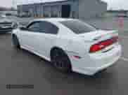 2013 Dodge Charger SRT-8 z VIN 2C3CDXEJXDH675646, wystawiony jako IAAI lot #41464139 z przebiegiem 105 583 mil mil oraz . Historia ofert i sprzedaży dostępna na DreamBid. Obrazek 3.