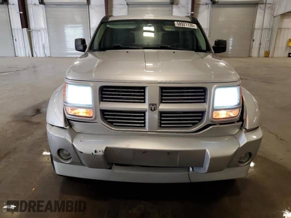 2007 Dodge Nitro R/T с VIN 1D8GU586X7W682807, выставлен на аукционе Copart как лот 58921135 с пробегом 153 492 миль миль и Списание • Salvage title. История ставок и продаж доступна на DreamBid. Изображение 5.
