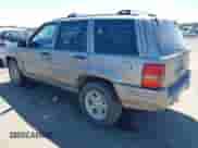 1998 Jeep Grand Cherokee Limited z VIN 1J4GZ78S1WC302742, wystawiony jako IAAI lot #43024107 z przebiegiem 155 196 mil mil oraz . Historia ofert i sprzedaży dostępna na DreamBid. Obrazek 3.