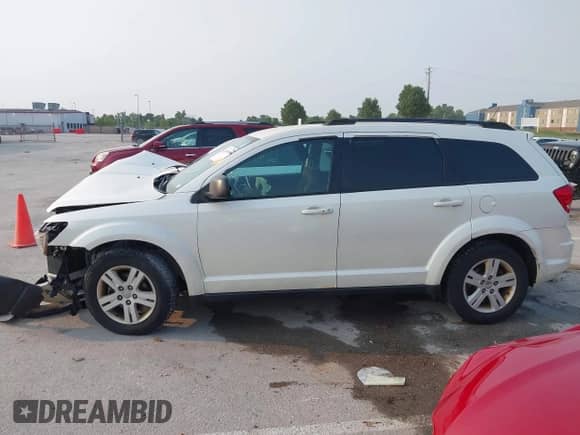 2012 Dodge Journey American Value с VIN 3C4PDCAB2CT314955, выставлен на аукционе IAAI как лот 42470916 с пробегом 108 753 миль миль и . История ставок и продаж доступна на DreamBid. Изображение 14.