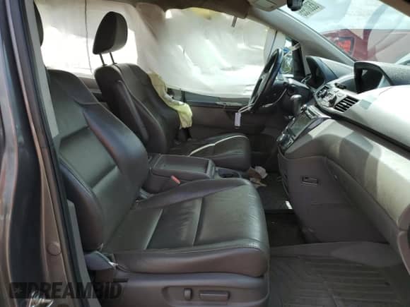 2015 Honda Odyssey Touring Elite с VIN 5FNRL5H9XFB073031, выставлен на аукционе Copart как лот 85307555 с пробегом 126 654 миль миль и Списание • Salvage title. История ставок и продаж доступна на DreamBid. Изображение 7.