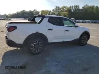 2024 Hyundai Santa Cruz SEL z VIN 5NTJBDDE5RH103900, wystawiony jako Copart lot #65919745 z przebiegiem 3 394 mil mil oraz Szkoda całkowita • Salvage title. Historia ofert i sprzedaży dostępna na DreamBid. Obrazek 3.