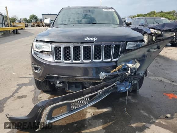 2015 Jeep Grand Cherokee Overland with VIN 1C4RJECG2FC872164, listed as a Copart auction lot 69685435 with 140,939 mi miles and Salvage title. Bid and sale history available at DreamBid. Image 5.