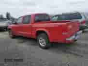 2004 Dodge Dakota Sport z VIN 1D7HL38N04S547877, wystawiony jako Copart lot #80321755 z przebiegiem 188 454 mil mil oraz Czysty tytuł • Clean title. Historia ofert i sprzedaży dostępna na DreamBid. Obrazek 2.