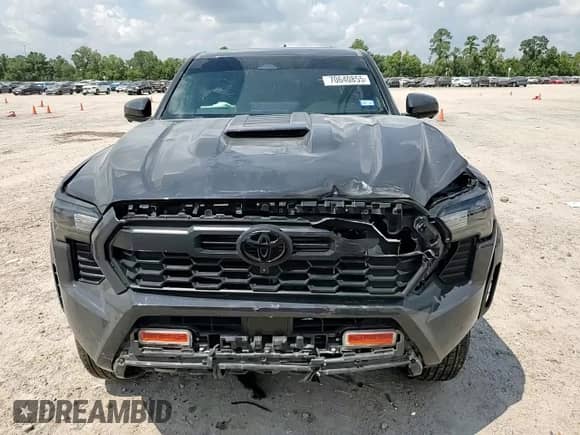 2024 Toyota Tacoma SR5 with VIN 3TMLB5JN1RM024042, listed as a Copart auction lot 70640855 with 23,853 mi miles and Salvage title. Bid and sale history available at DreamBid. Image 13.
