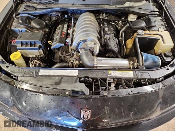 2006 Dodge Charger SRT-8 с VIN 2B3LA73W86H472570, выставлен на аукционе Copart как лот 71622825 с пробегом 147 605 миль миль и Списание • Salvage title. История ставок и продаж доступна на DreamBid. Изображение 11.