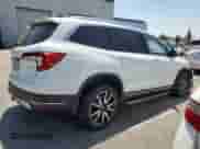 2020 Honda Pilot Touring 8-Passenger с VIN 5FNYF5H92LB005918, выставлен на аукционе Copart как лот 65788835 с пробегом 114 502 миль миль и Списание • Salvage title. История ставок и продаж доступна на DreamBid. Изображение 3.