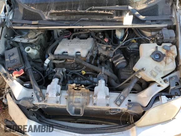 2004 Chevrolet Venture LS с VIN 1GNDU03E64D242892, выставлен на аукционе Copart как лот 76992824 с пробегом Не указан миль и Списание • Salvage title. История ставок и продаж доступна на DreamBid. Изображение 14.