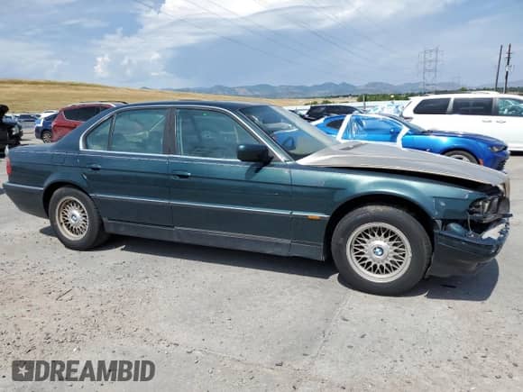 1998 BMW 7 Series 740i z VIN WBAGF8325WDL51588, wystawiony jako Copart lot #66292195 z przebiegiem 121 919 mil mil oraz Szkoda całkowita • Salvage title. Historia ofert i sprzedaży dostępna na DreamBid. Obrazek 4.
