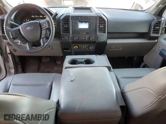 2019 Ford F-150 XL with VIN 1FTFX1E50KKE16508, listed as a Copart auction lot 83863085 with 128,011 mi miles and Salvage title. Bid and sale history available at DreamBid. Image 8.