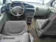 1997 Dodge Caravan SE z VIN 2B4GP44R4VR202585, wystawiony jako Copart lot #68703985 z przebiegiem 188 500 mil mil oraz Szkoda całkowita • Salvage title. Historia ofert i sprzedaży dostępna na DreamBid. Obrazek 8.