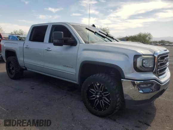 2016 GMC Sierra 1500 SLE with VIN 3GTP1MEC6GG216754, listed as a Copart auction lot 58865465 with Not provided miles and Salvage title. Bid and sale history available at DreamBid. Image 4.