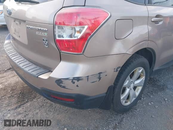 2014 Subaru Forester Premium with VIN JF2SJACC4EG405795, listed as a IAAI auction lot 42762451 with 267,393 mi miles and . Bid and sale history available at DreamBid. Image 6.