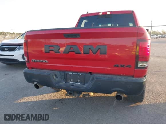 2018 Ram 1500 Rebel with VIN 1C6RR7YT8JS178952, listed as a IAAI auction lot 40514135 with 122,955 mi miles and . Bid and sale history available at DreamBid. Image 16.