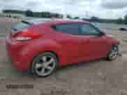 2013 Hyundai Veloster w/Black Int z VIN KMHTC6AD5DU173242, wystawiony jako Copart lot #54733125 z przebiegiem 157 766 mil mil oraz Czysty tytuł • Clean title. Historia ofert i sprzedaży dostępna na DreamBid. Obrazek 3.