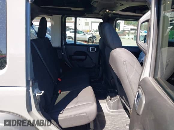 2022 Jeep Wrangler Unlimited Sport S z VIN 1C4HJXDG1NW200793, wystawiony jako IAAI lot #41810817 z przebiegiem 35 212 mil mil oraz . Historia ofert i sprzedaży dostępna na DreamBid. Obrazek 8.