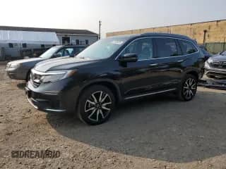 2021 Honda Pilot Touring 7-Passenger z VIN 5FNYF6H64MB079936, wystawiony jako Copart lot #67438325 z przebiegiem 62 644 mil mil oraz Szkoda całkowita • Salvage title. Historia ofert i sprzedaży dostępna na DreamBid. Obrazek 1.