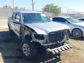 2018 Toyota Tacoma SR5 with VIN 5TFAZ5CN8JX054363, listed as a IAAI auction lot 43012474 with 138,074 mi miles and . Bid and sale history available at DreamBid. Image 1.