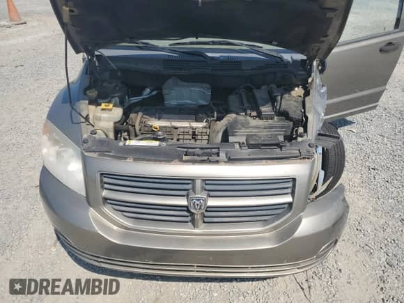 2007 Dodge Caliber z VIN 1B3HB28C47D138846, wystawiony jako Copart lot #62100605 z przebiegiem 201 902 mil mil oraz Szkoda całkowita • Salvage title. Historia ofert i sprzedaży dostępna na DreamBid. Obrazek 11.