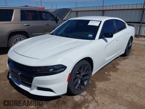 2022 Dodge Charger SXT with VIN 2C3CDXBG4NH157428, listed as a IAAI auction lot 42826112 with 39,662 mi miles and . Bid and sale history available at DreamBid. Image 2.