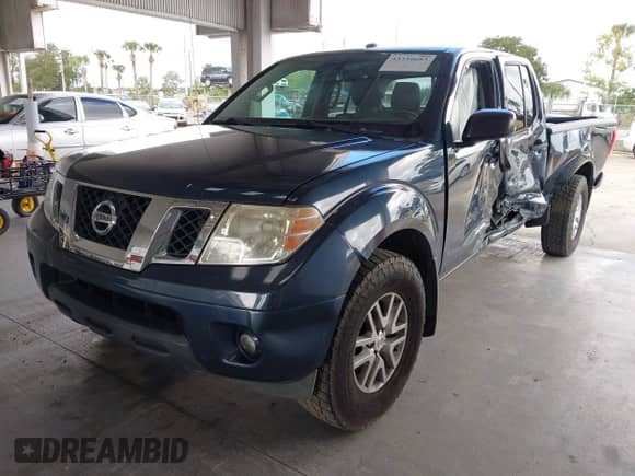 2015 Nissan Frontier SV with VIN 1N6AD0FV1FN742136, listed as a IAAI auction lot 43330683 with 130,630 mi miles and . Bid and sale history available at DreamBid. Image 2.