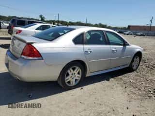 2013 Chevrolet Impala LT z VIN 2G1WG5E33D1158342, wystawiony jako Copart lot #70051405 z przebiegiem 178 067 mil mil oraz Czysty tytuł • Clean title. Historia ofert i sprzedaży dostępna na DreamBid. Obrazek 3.