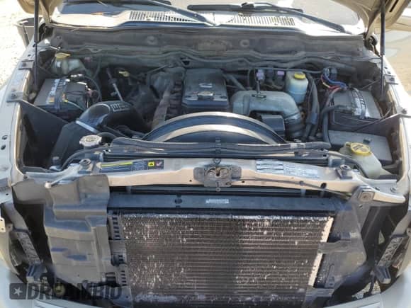 2004 Dodge 2500 SLT z VIN 3D7KU28C14G234615, wystawiony jako Copart lot #61453145 z przebiegiem 289 052 mil mil oraz Szkoda całkowita • Salvage title. Historia ofert i sprzedaży dostępna na DreamBid. Obrazek 11.