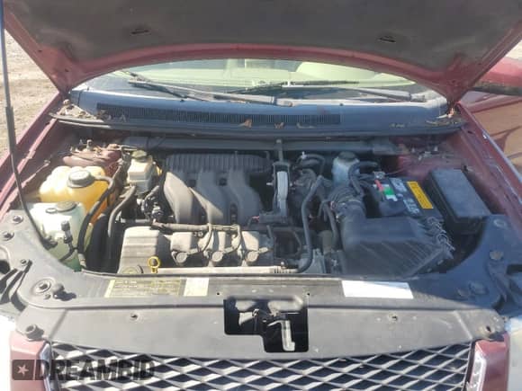 2006 Ford Freestyle Limited with VIN 1FMDK06136GA08228, listed as a Copart auction lot 69879995 with 214,776 mi miles and Salvage title. Bid and sale history available at DreamBid. Image 12.