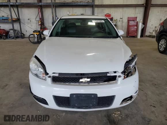 2012 Chevrolet Impala LTZ with VIN 2G1WC5E30C1221083, listed as a Copart auction lot 81643965 with 153,674 mi miles and Salvage title. Bid and sale history available at DreamBid. Image 5.