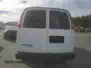 2014 Chevrolet Express Passenger 1LS with VIN 1GAZGZFAXE1105162, listed as a Copart auction lot 72773154 with 97,950 mi miles and Salvage title. Bid and sale history available at DreamBid. Image 6.