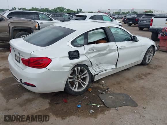 2019 BMW 4 Series 430i with VIN WBA4J1C53KBM14633, listed as a IAAI auction lot 42274320 with 70,460 mi miles and . Bid and sale history available at DreamBid. Image 4.
