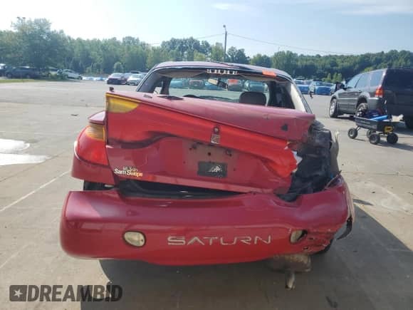 2002 Saturn SC with VIN 1G8ZR12722Z250958, listed as a Copart auction lot 68510985 with Not provided miles and Salvage title. Bid and sale history available at DreamBid. Image 6.