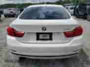 2015 BMW 4 Series 428i z VIN WBA4A5C52FGK16061, wystawiony jako Copart lot #63253235 z przebiegiem 145 017 mil mil oraz Szkoda całkowita • Salvage title. Historia ofert i sprzedaży dostępna na DreamBid. Obrazek 6.