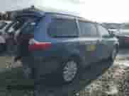 2015 Toyota Sienna LE with VIN 5TDJK3DC9FS120843, listed as a Copart auction lot 86258135 with 124,396 mi miles and Clean title. Bid and sale history available at DreamBid. Image 3.