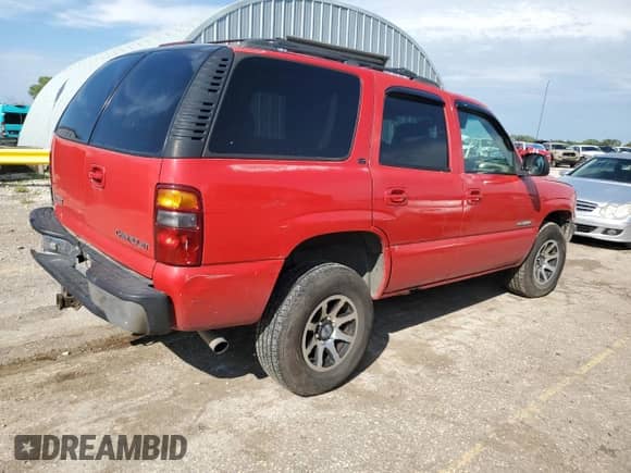 2001 Chevrolet Tahoe LT with VIN 1GNEK13T41J101699, listed as a Copart auction lot 80453265 with 285,000 mi miles and Salvage title. Bid and sale history available at DreamBid. Image 3.