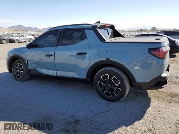 2022 Hyundai Santa Cruz SEL with VIN 5NTJCDAE6NH009830, listed as a Copart auction lot 71629124 with 42,707 mi miles and Salvage title. Bid and sale history available at DreamBid. Image 2.