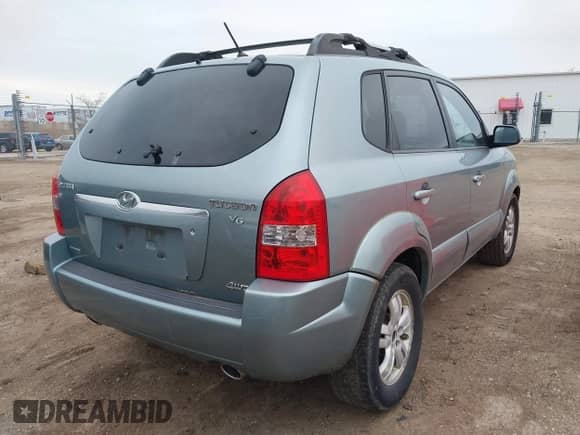 2007 Hyundai Tucson SE z VIN KM8JN72D47U482954, wystawiony jako IAAI lot #41902192 z przebiegiem 170 045 mil mil oraz . Historia ofert i sprzedaży dostępna na DreamBid. Obrazek 4.