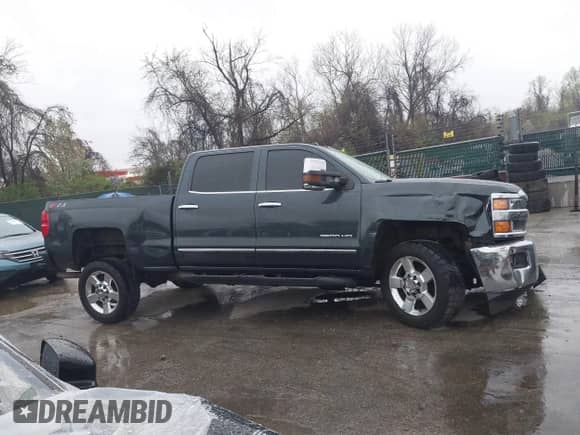 2019 Chevrolet Silverado 2500HD LTZ with VIN 1GC1KTEG1KF260607, listed as a IAAI auction lot 41965273 with 153,218 mi miles and . Bid and sale history available at DreamBid. Image 14.
