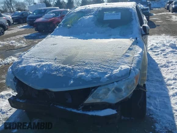 2014 Toyota Camry SE with VIN 4T1BK1FK6EU026342, listed as a IAAI auction lot 41246628 with 142,586 mi miles and . Bid and sale history available at DreamBid. Image 6.