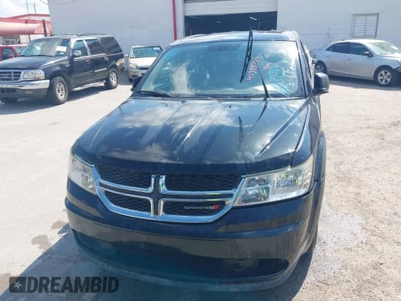 2012 Dodge Journey American Value z VIN 3C4PDCAB6CT389481, wystawiony jako IAAI lot #43359773 z przebiegiem 164 652 mil mil oraz . Historia ofert i sprzedaży dostępna na DreamBid. Obrazek 6.