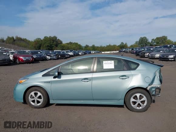 2015 Toyota Prius Four z VIN JTDKN3DU3F1977760, wystawiony jako IAAI lot #43233363 z przebiegiem 101 831 mil mil oraz . Historia ofert i sprzedaży dostępna na DreamBid. Obrazek 14.
